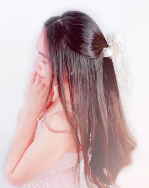Woman with Long Shiny Hair