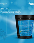 Body butter container with blue label on a blue background, featuring Organic Mimi branding.