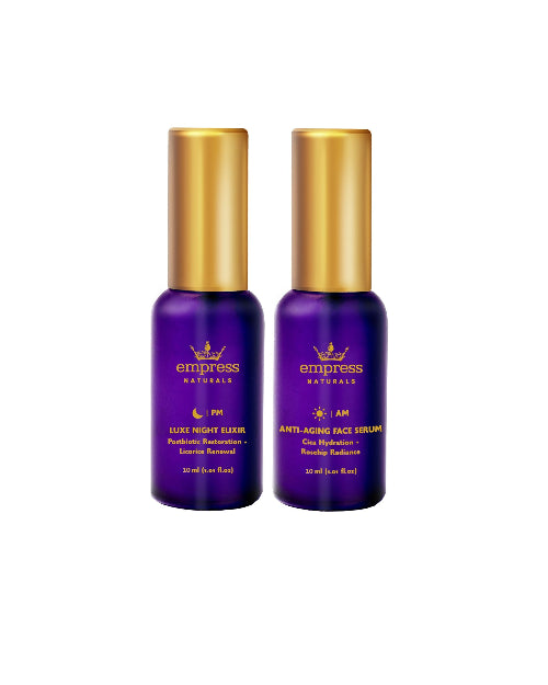 Two purple serum bottles with gold caps labeled 'empress Naturals' on a white background.