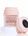 Noori moisturizer jar with pink lid on a white background