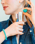 Chakra 5 Communication roll on in hand