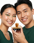Two people holding a wooden product against a white background