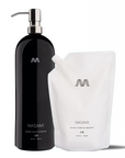 A black ceramic refillable shampoo bottle with a pump dispenser alongside a white refill pouch, both labeled with the brand name 'MASAMI'.