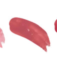 Three swatches of pink lipsticks on a white background