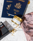 Berry & Bough Pivotal Moments travel candle with passports