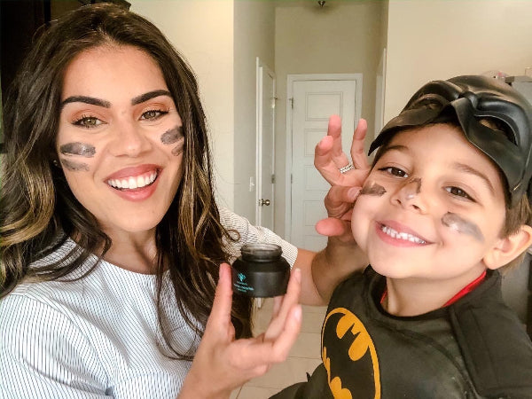 Mom and boy with Olecea mask