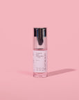 Auve Beauty plump and glow smoothing lip oil on pink background