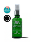 Green bottle of Masami Mekabu Shine Serum with awards on a white background