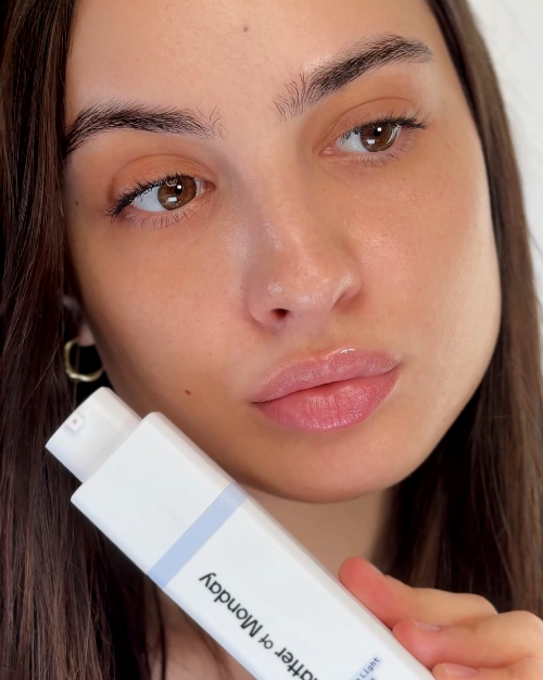 Matter of Monday Anti Blue light serum held by the face