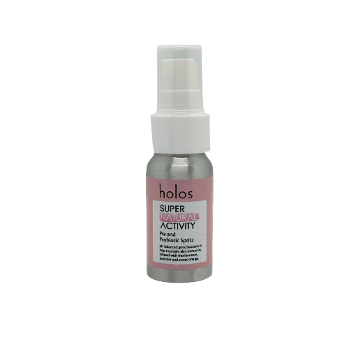 Holos Super Natural Activity pre and post-micropigmentation spray bottle on a white background