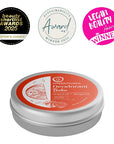 Deodorant balm tin with awards on a white background