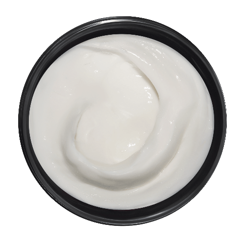 Black container with white cream on a dark background