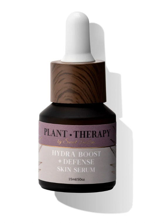 Skincare serum bottle with dropper labeled 'Plant Therapy' on a white background