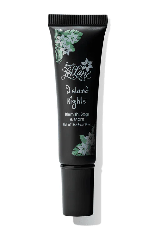 Black skincare tube labeled 'Island Nights' with floral designs on a white background