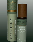 Plant Therapy skincare product with green and brown packaging on a gray background