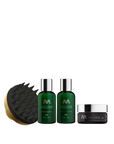 A set of MASAMI haircare products including shampoo, conditioner, styling cream, and a scalp scrubber brush.