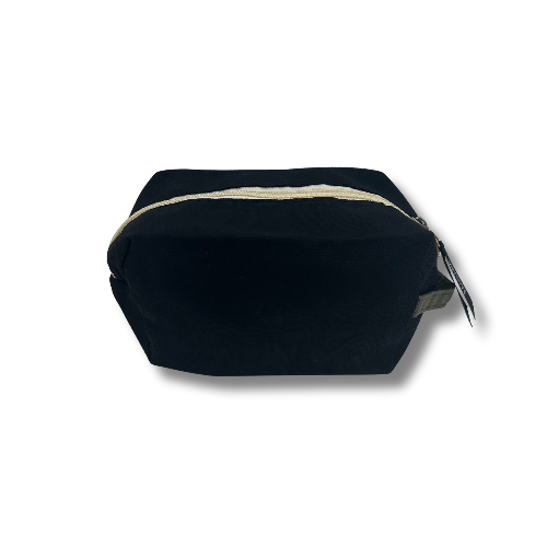 Black pouch with a white zipper on a white background