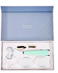 A deluxe gift set by LUNAESCENT containing a skincare applicator and two silicone pads, presented in a luxury keepsake box with a gold-colored low-scoop spatula.