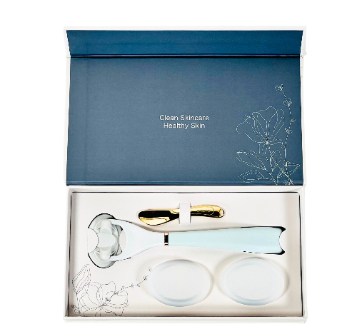 A deluxe gift set by LUNAESCENT containing a skincare applicator and two silicone pads, presented in a luxury keepsake box with a gold-colored low-scoop spatula.