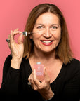 Caire Beauty model with serum
