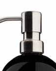 Close up of stainless steel bottle pump