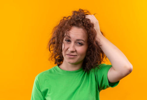 What Causes Hair to Feel Frizzy, Dull, or Straw-Like?