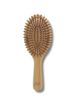 Wooden hairbrush on a white background
