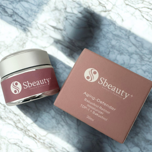 Sbeauty skincare product jar and box on a textured surface