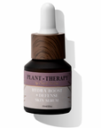 Skincare serum bottle with dropper labeled 'Plant Therapy' on a white background
