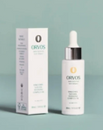 ORVOS bottle and box on green background