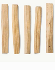 Seven natural wood strips of varying lengths and slightly curved shapes, arranged vertically on a plain white background.
