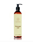 Bottle of Idra Wellness massage oil on white background