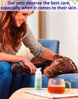Woman petting a dog on a couch with a bottle of pet product and a mug in the foreground.