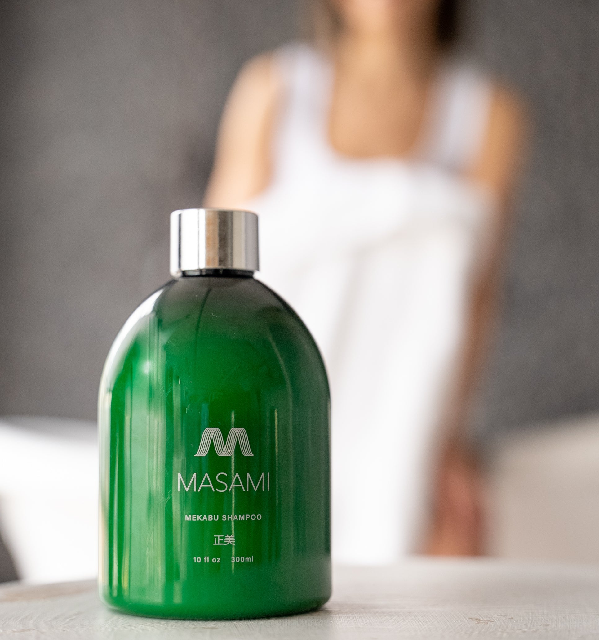 MASAMI hydrating shampoo with girl in background